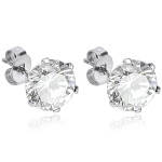 Boucles d'oreilles puces en acier chirurgical 316L et oxyde de zirconium.