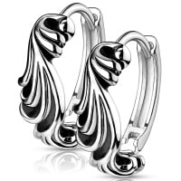 Boucles d'oreilles créoles en acier argenté.