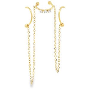 Sublimez votre look avec cette bague d'oreilles en acier doré, un symbole d'élégance moderne. La boucle principale est délicatement ornée de strass ronds taille brillant, apportant un éclat subtil. Le design unique, avec des chaînes pendantes, ajoute une touche sophistiquée et un mouvement gracieux à votre allure. Idéales pour rehausser une tenue de soirée ou apporter une touche de luxe au quotidien. Vendu à l'unité.