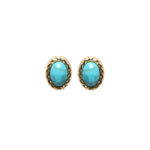 Boucles d'oreilles puces de forme ovale en acier doré serties d'un cabochon de couleur bleue turquoise.