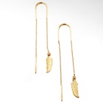 Boucles d'oreilles plumes en plaqué or jaune 18 carats.