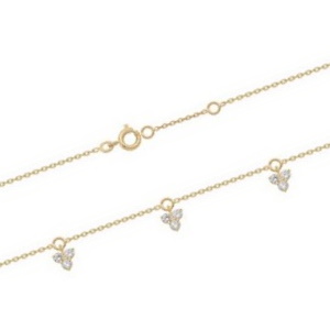 Bracelet de cheville composé d'une chaîne en plaqué or jaune 18 carats et de 3 pampilles serties de trois oxydes de zirconium blancs. Fermoir anneau ressort avec des anneaux de rappel à 23 et 25 cm.