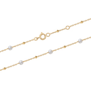 Bracelet de cheville composé d'une chaîne avec boules en plaqué or jaune 18 carats et de perles d'eau douce. Fermoir anneau ressort avec anneaux de rappel à 23 et 25 cm.