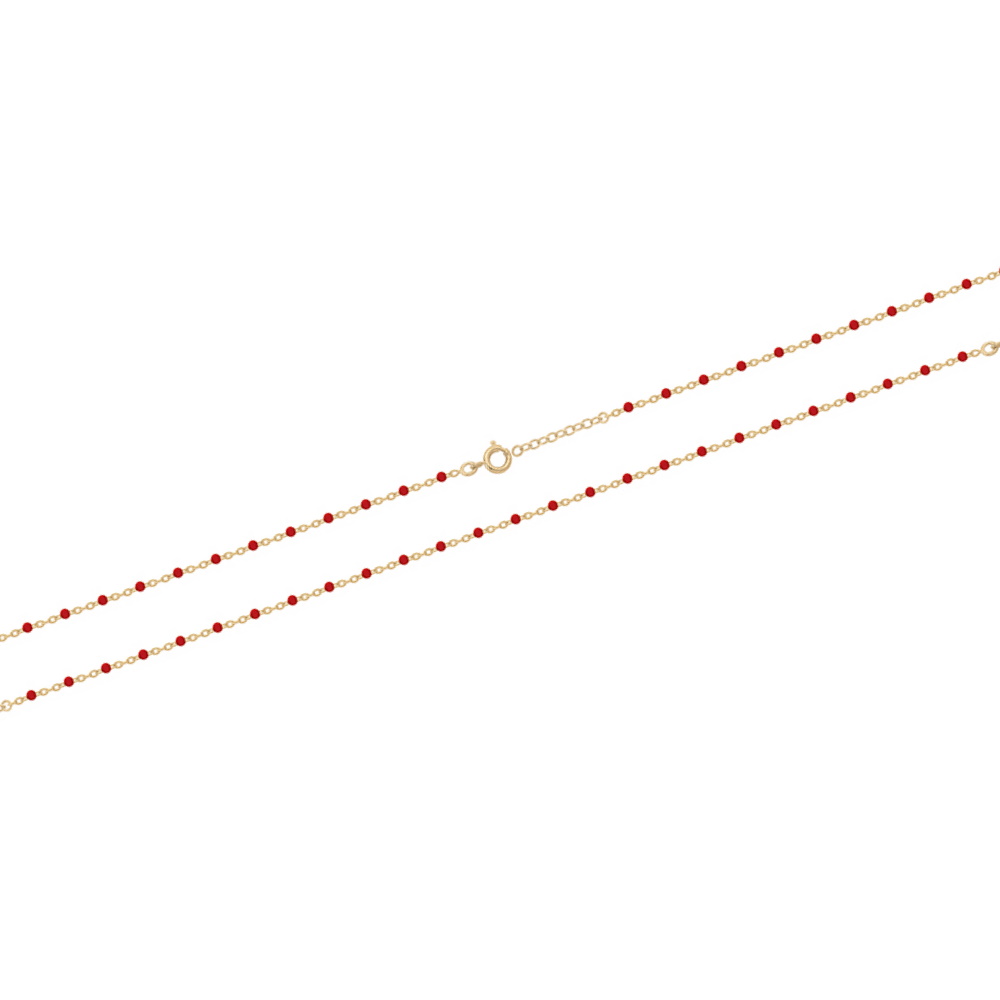 Bracelet chaîne cheville composé d'une chaîne en plaqué or jaune 18 carats et de perles en résine de couleur rouge corail.<br/>Fermoir anneau ressort 2 cm de rallonge. Cheville Perle  Adolescent Adulte Femme Fille Indémodable 