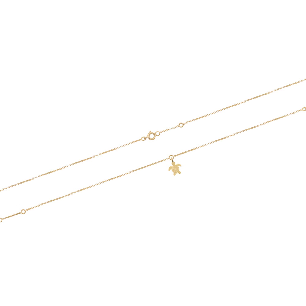 Bracelet chaîne de cheville composé d'une chaîne et d'une tortue de mer en plaqué or jaune 18 carats.<br/>Fermoir anneau ressort avec anneaux de rappel à 23 et 25 cm. Cheville Tortue  Adolescent Adulte Animaux Femme Fille Indémodable 