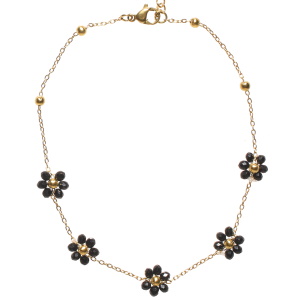 Bracelet chaîne de cheville composé d'une chaîne avec perles en acier doré et de fleurs de perles de couleur noire. Fermoir mousqueton avec 4 cm de rallonge.