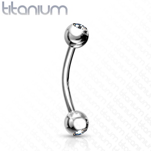 Piercing haltère en titane argenté serti clos d'un oxyde de zirconium.