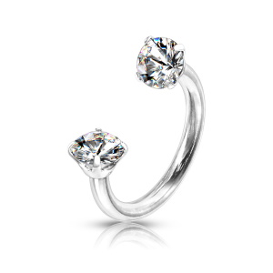 Piercing fer à cheval en acier argenté chirurgical 316L serti griffes de deux oxydes de zirconium blanc.