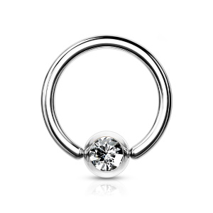 Piercing en acier argenté chirurgical 316L serti clos d'un cristal.