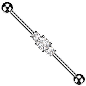 Piercing haltère en acier 316L chirurgical serti de trois oxydes de zirconium blancs.
