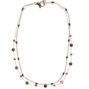 Bracelet chaîne de cheville double rangs composé d'une chaîne en acier doré et de perles en émail de couleur noire, ainsi qu'une chaîne avec des perles en acier doré et des perles noires. Fermoir mousqueton avec 5 cm de rallonge.