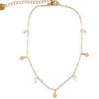 Bracelet chaîne de cheville composé d'une chaîne avec pampilles en forme d'étoile en acier doré et de pampilles cristaux. Fermoir mousqueton avec 5 cm de rallonge.
