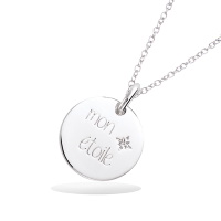 Pendentif pastille ronde avec l'inscription Mon étoile en argent 925/000 rhodié et un oxyde de zirconium blanc serti clos. Pendentif vendu seul sans chaîne.