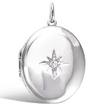 Pendentif porte photo en argent 925/000 rhodié et étoile en oxyde de zirconium.