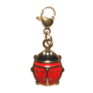 Breloque charm's en acier doré avec une coccinelle pavée d'émail.