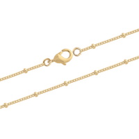 Bracelet composé d'une chaîne avec boules en plaqué or jaune 18 carats. Fermoir mousqueton avec 5 cm de rallonge.