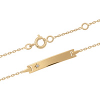 Bracelet gourmette en plaqué or jaune 18 carats serti d'un oxyde de zirconium blanc en forme d'étoile. Fermoir anneau ressort avec anneaux de rappel à 13 et 15 cm.