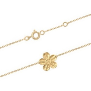 Bracelet composé d'une chaîne et d'une fleur en plaqué or jaune 18 carats. Fermoir anneau ressort avec 3 cm de rallonge.