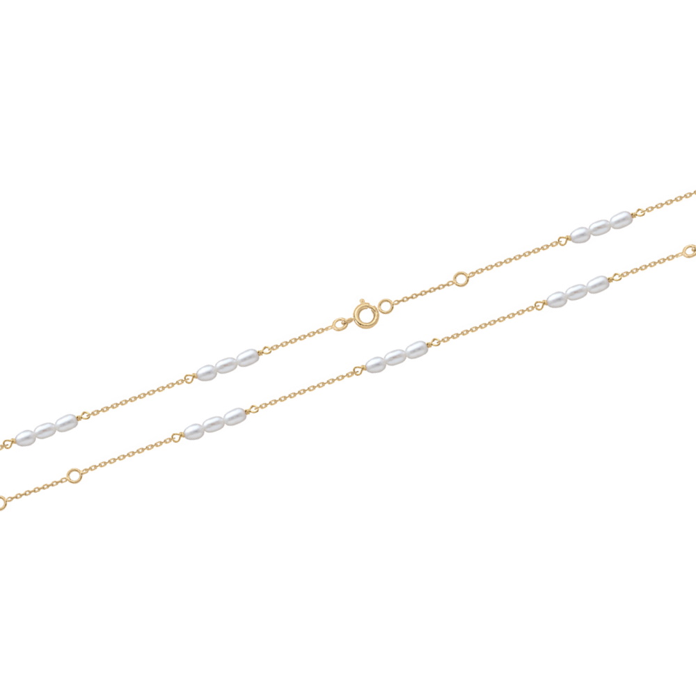 Bracelet composé d'une chaîne en plaqué or jaune 18 carats et de perles d'eau douce.<br/>Fermoir anneau ressort avec anneaux de rappel à 15 et 17 cm. Perle  Adolescent Adulte Femme Fille Indémodable 