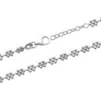 Bracelet composé d'une série de motifs en mini boules en argent 925/000 rhodié. Fermoir mousqueton avec 2 cm de rallonge.