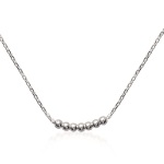 Collier sept boules en argent 925/000 rhodié.