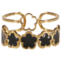 Bague double rangs en acier doré avec fleurs pavées d'émail de couleur noir. Taille ajustable.