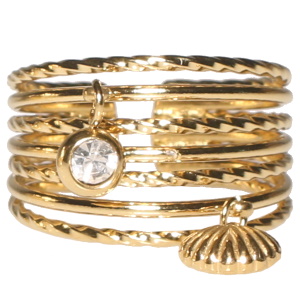 Bague multi rangs avec un pendant coquillage en acier doré et un pendant serti clos d'un strass. Taille ajustable.