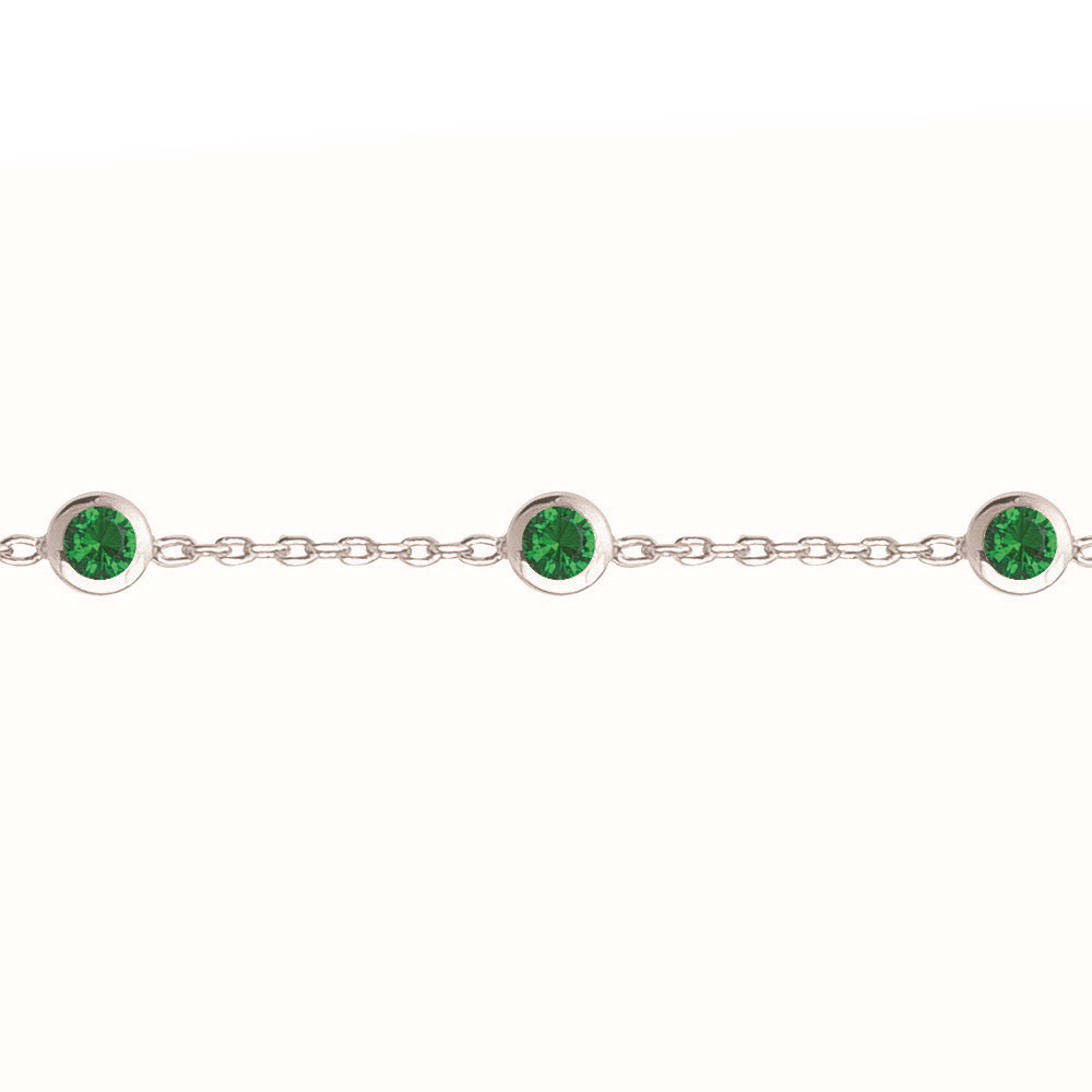 Bracelet composé d'une chaîne en argent 925/000 rhodié et de cinq oxydes de zirconium de couleur vert sertis clos.<br/>Fermoir anneau ressort avec 3 cm de rallonge. Rond Strass  Adolescent Adulte Femme Fille Indémodable 