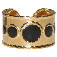 Bague en acier doré pavée de cinq pavages ronds d'émail de couleur noir. Taille ajustable.