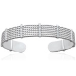 Bracelet jonc rigide en argent 925/000 rhodié et oxydes de zirconium.