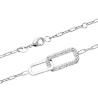 Bracelet composé d'une chaîne et de deux maillons en argent 925/000 rhodié dont un pavé d'oxydes de zirconium blancs. Fermoir mousqueton avec anneaux de rappel à 16 et 18 cm.