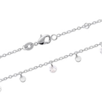 Bracelet composé d'une chaîne avec pampilles en argent 925/000 rhodié et des pampilles en oxyde de zirconium blanc. Fermoir mousqueton avec anneaux de rappel à 16 et 18 cm.