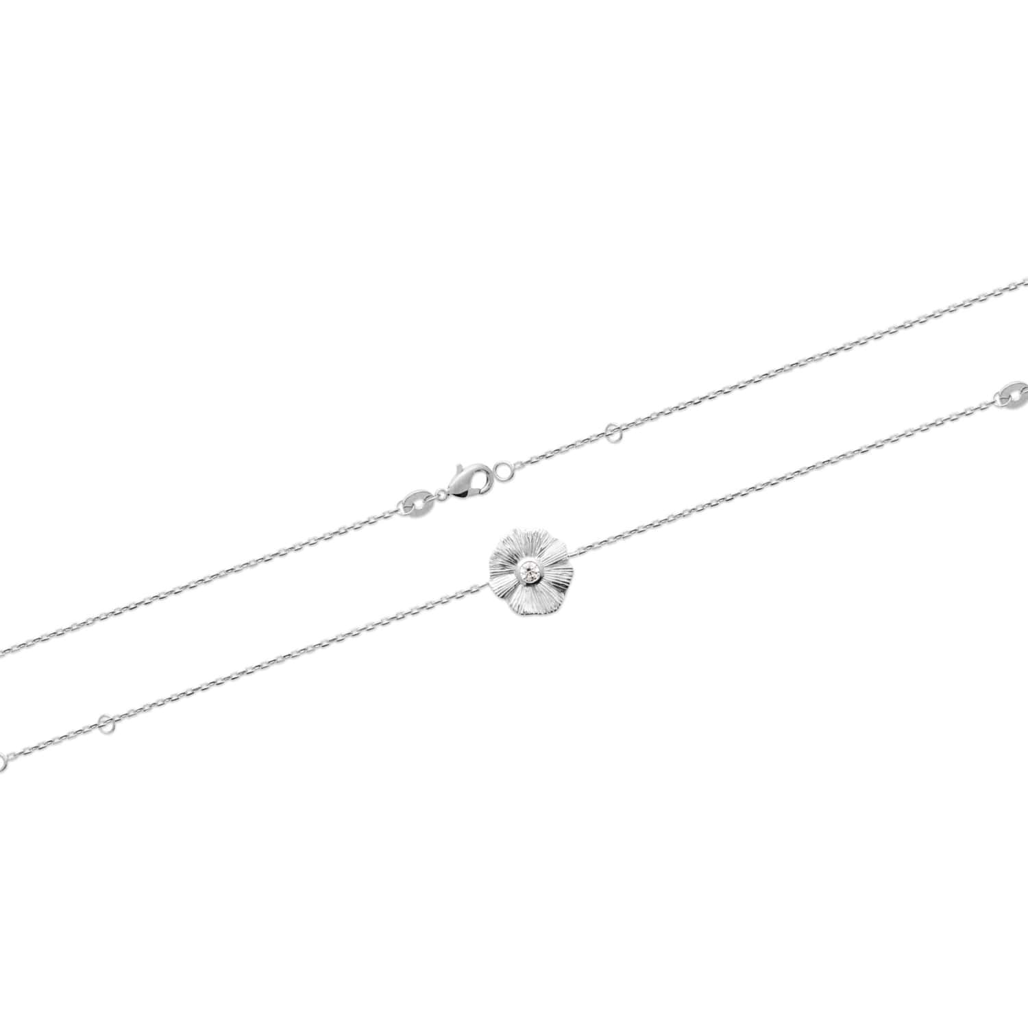 Bracelet avec feuille en argent 925/000 rhodié et monté d'un oxyde de zirconium serti clos de forme ronde.<br/>Fermoir mousqueton avec anneaux de rappel à 16 et 18 cm. Feuille  Adolescent Adulte Femme Fille Indémodable Nature 