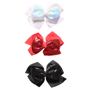 Barrette pince nœud papillon pour cheveux. Idéal pour les fêtes de fin d'année. 3 coloris différents.