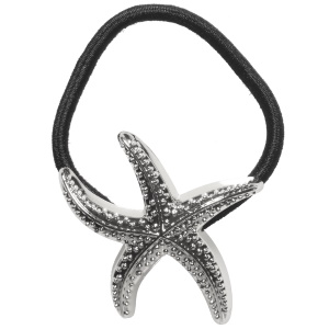 Elastique pour cheveux surmonté d'une étoile de mer en métal argenté.