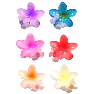 Pince crabe pour cheveux en forme de fleur en plastique multicolore avec un papillon en tissu synthétique et serti de strass. 6 coloris différents. Vendu à l'unité. Votre préférence en commentaire.