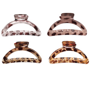 Pince crabe pour cheveux de couleur transparente avec motifs léopard. 4 coloris différentes. Vendu à l'unité. Votre préférence en commentaire.