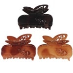 Pince crabe pour cheveux au motif papillon en plastique de couleur. 3 coloris différents. Vendu à l'unité.