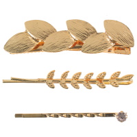 Lot de 3 épingles aux motifs divers (feuilles, branche de laurier) en métal doré et cristal serti griffes.