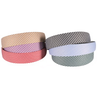 Serre-tête en textile de couleur avec motifs. 6 coloris différents. Vendu à l'unité.