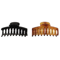 Pince crabe pour cheveux en plastique de couleur. 2 coloris différents. Vendu à l'unité.