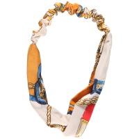 Bandeau élastique pour cheveux en textile de couleur avec motifs.