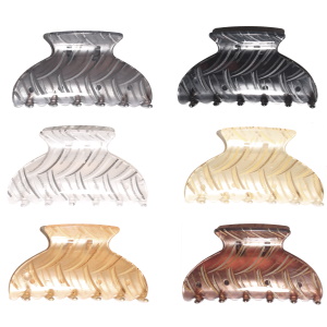 Pince crabe pour cheveux en plastique de couleur avec motifs. 6 coloris différents. Votre préférence en commentaire Vendu à l'unité.