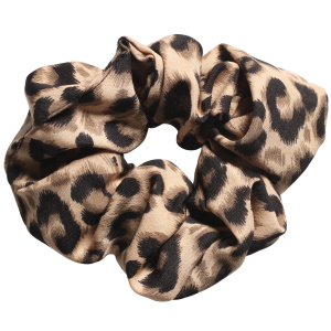 Chouchou élastique pour cheveux en textile de couleur avec motifs.
