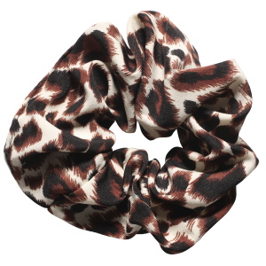 Chouchou élastique pour cheveux en textile de couleur avec motifs.