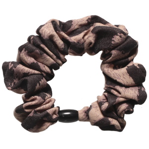 Chouchou élastique pour cheveux en textile de couleur avec motifs.