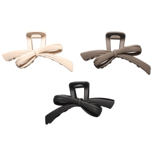 Pince crabe pour cheveux en forme de nœud papillon en plastique de couleur. 3 coloris différents. Vendu à l'unité. Votre préférence en commentaire.