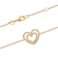 Bracelet composé d'une chaîne et d'un double cœur en plaqué or jaune 18 carats. Fermoir mousqueton avec anneaux de rappel à 16 et 18 cm.
