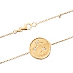 Bracelet avec motif de la constellation du signe du zodiaque Balance (Libra en latin) en plaqué or et oxydes de zirconium.