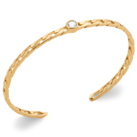 Bracelet jonc ouvert rigide au motif de chaîne en plaqué or jaune 18 carats surmonté d'un oxyde de zirconium blanc serti clos de forme ronde.